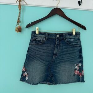Express denim mini skirt with floral embroidery